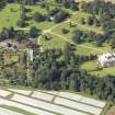 Oblique aerial view centred on the country house with the gardens adjacent , taken from the E.