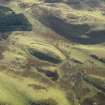 Oblique aerial view centred on the remains of the fort, taken from the NNW.