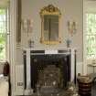 Interior. 1st floor, drawing room, view of fireplace with mirror above