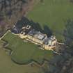 Oblique aerial view centred on the country house, taken from the SW.