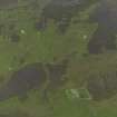 Oblique aerial view centred on the remains of the farmsteads, field systems and head dykes, taken from the WSW.