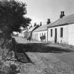 View of houses in main street Arinagour Isle of Coll