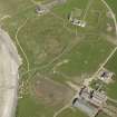 General oblique aerial view centred on Skara Brae with Skaill House and farm adjacent, taken from the W.
