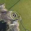 Oblique aerial view centred on Midhowe broch, Rousay, taken from the SSW.