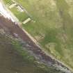 Oblique aerial view centred on the excavations at Castle of Stackel Brae, taken from the SE.