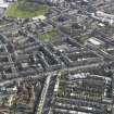 Oblique aerial view centred on Leith Walk, taken from the NW.