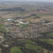 General oblique aerial view centred on the housing estate, taken from the SW.