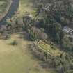 Oblique aerial view centred on the walled garden with the country house adjacent, taken from the NNW.