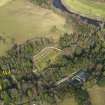 Oblique aerial view centred on the walled garden with the country house adjacent, taken from the SW.