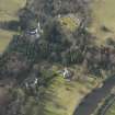 Oblique aerial view centred on the country house with the walled garden adjacent, taken from the SE.
