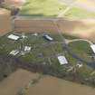 Oblique aerial view of East Fortune Airfield technical area, taken from the SE.