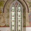 Interior. View of stained glass window in S wall