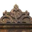 Detail of carved dormer window pediment on extension block to N..