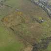 Oblique aerial view centred on the remains of the heavy anti aircraft battery, taken from the NW.