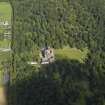 General oblique aerial view centred on the house, taken from the S.