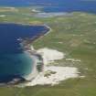 General oblique aerial view of the N of Westray centred on Links of Noltland settlement, taken from the W.