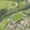 Oblique aerial view of Annan Athletic Football Club, taken from the SSE.