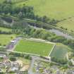 Oblique aerial view of Annan Athletic Football Club, taken from the ESE.