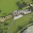 Oblique aerial view of Kinmount House and rose garden, taken from the NNE.