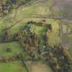 Oblique aerial view centred on the country house, taken from the W.