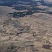 General oblique aerial view centred on the remains of the Woodhead lead mine, taken from the S.