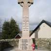 View from SE of war memorial base, cross and names in Stow, the Scottish Borders.