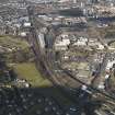 Oblique aerial view of the city showing the route of the M74 extension going through the Rutherglen to Polamadie area centred on Power Motive Works, taken from the ESE.