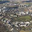 General oblique aerial view of Glasgow city centre, centred on the cathedral, taken from the SE.
