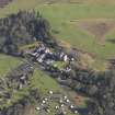 Oblique aerial view centred on the country house with the caravan park adjacent, taken from the SW.