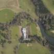 Oblique aerial view centred on the country house with the formal garden adjacent, taken from the WSW.