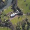 Oblique aerial view centred on the country house with the formal garden adjacent, taken from the N.