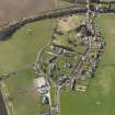 Oblique aerial view centred on the village, taken from the NE.