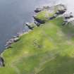 General oblique aerial view of the Broch of Burraland looking towards Hoga, taken from the WNW.