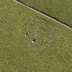 Oblique aerial view of the remains of the stone circle at Old Bourtreebush, taken from the SSE.