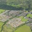 General oblique aerial view of Menstrie village, taken from the SE.