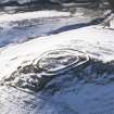 Oblique aerial view of fort under snow, looking to WSW.