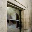 Interior. Basement vault. Moulded doorway. Detail