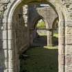 Arcading in chapter house, view through E entrance