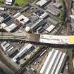 Oblique aerial view of the M74 extension going through the Port Eglinton area centred on the engine works, taken from the NE.