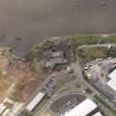 General oblique aerial view of Alloa, centred on former dock warehouse near Alloa Park, taken from the NE