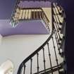 Interior. E corner balcony staircase.