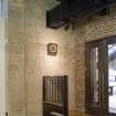 View of exhibit and doorway to gift shop area, Mackintosh furniture exhibition in basement of school.