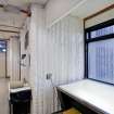 View of corrugated concrete stair tower from within studio space of Newbery Tower