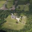 Oblique aerial view of Castle Toward country house and policies, taken from the S.