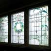 Interior. First floor.  East wing corridor.  Detail of stained glass.