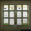 Interior. Second floor.  West staircase. Stained glass window.