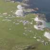General oblique aerial view of Scarinish, Tiree, looking to the ENE.