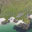 Oblique aerial view of Scarinish, Tiree, looking to the NNW.
