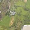 Oblique aerial view of Oronsay Farm and Priory, taken from the WNW.