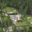 Oblique aerial view centred on the mansion taken from the SW.